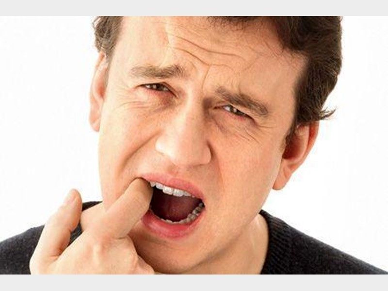 پوسیدگی دندان چیست؟ چگونه آن را درمان کنیم؟